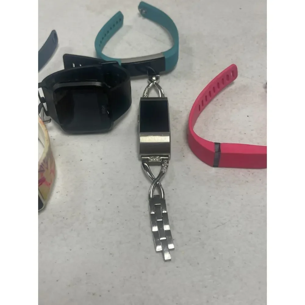 Lot of 7 Fitbit Mixed Brands Activity Tracker Smart Watches Untested For Parts